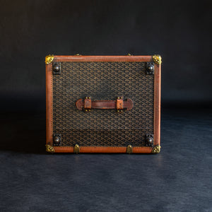 An unusual Goyard wardrobe trunk with original chevron pattern canvas covering, brass fittings and original cotton lined interior providing hanging space. 