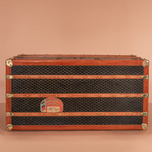 A stunning Goyard Steamer trunk with original chevron pattern canvas covering, brass catches and handles. The interior has the original lining and an original tray