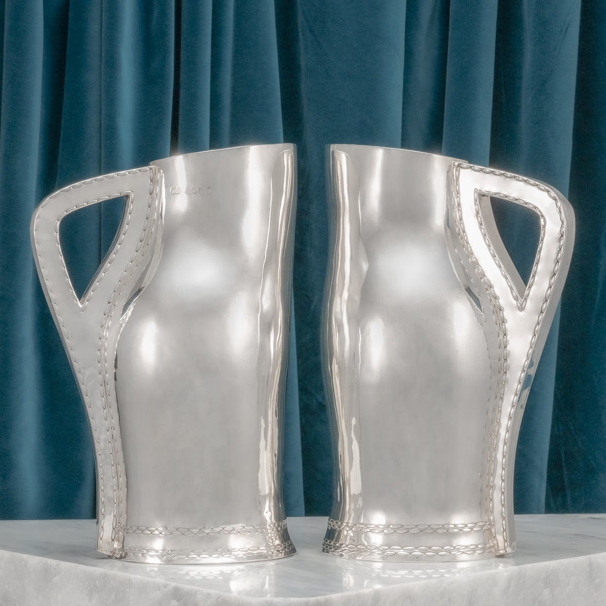 Pair of Silver 'Blackjack' Jugs