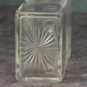 Silver Topped Glass Bottle