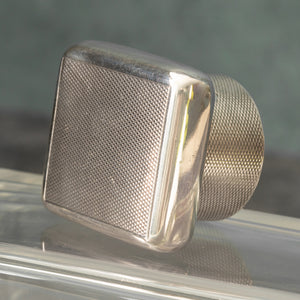 Silver Topped Glass Bottle
