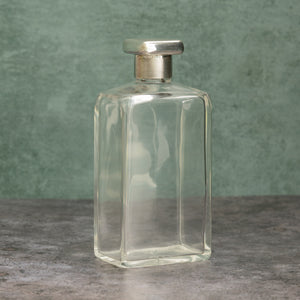 Silver Topped Glass Bottle