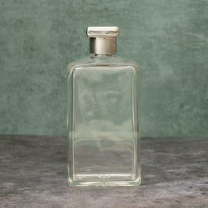 Silver Topped Glass Bottle