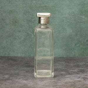 Silver Topped Glass Bottle