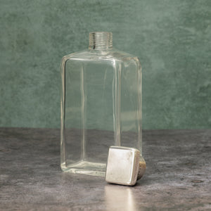 Silver Topped Glass Bottle