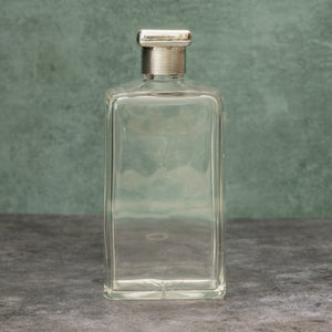 Silver Topped Glass Bottle