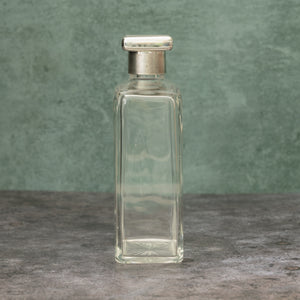 Silver Topped Glass Bottle