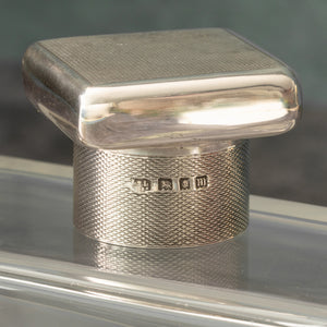 Silver Topped Glass Bottle
