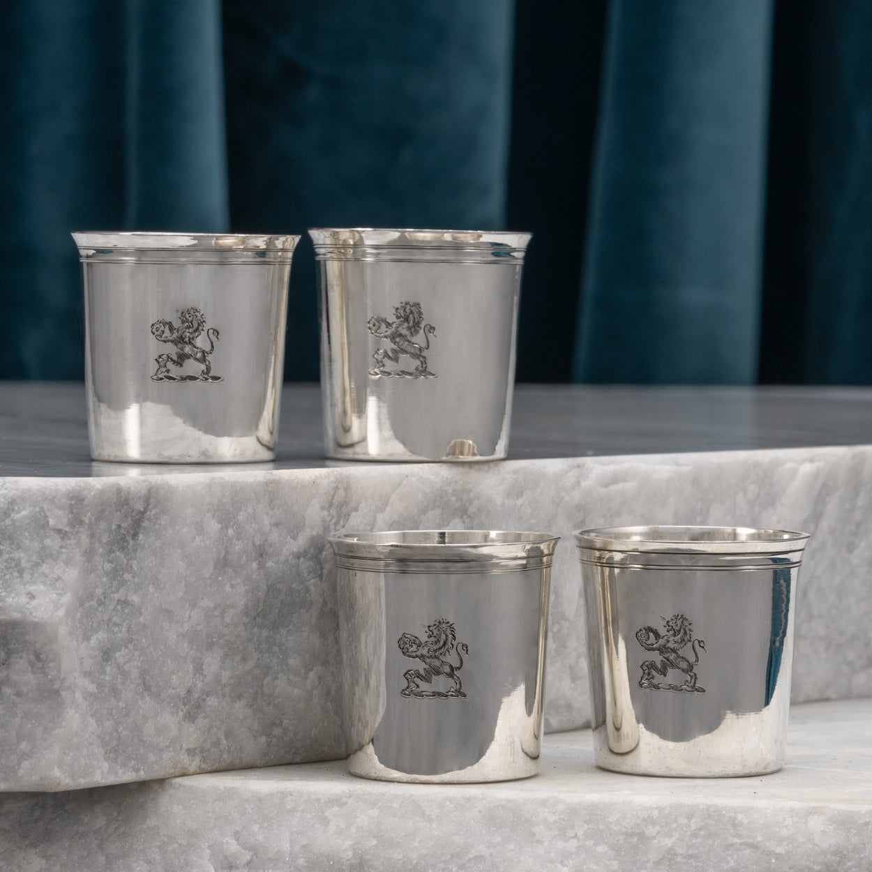 Set of Four Small Silver Beakers