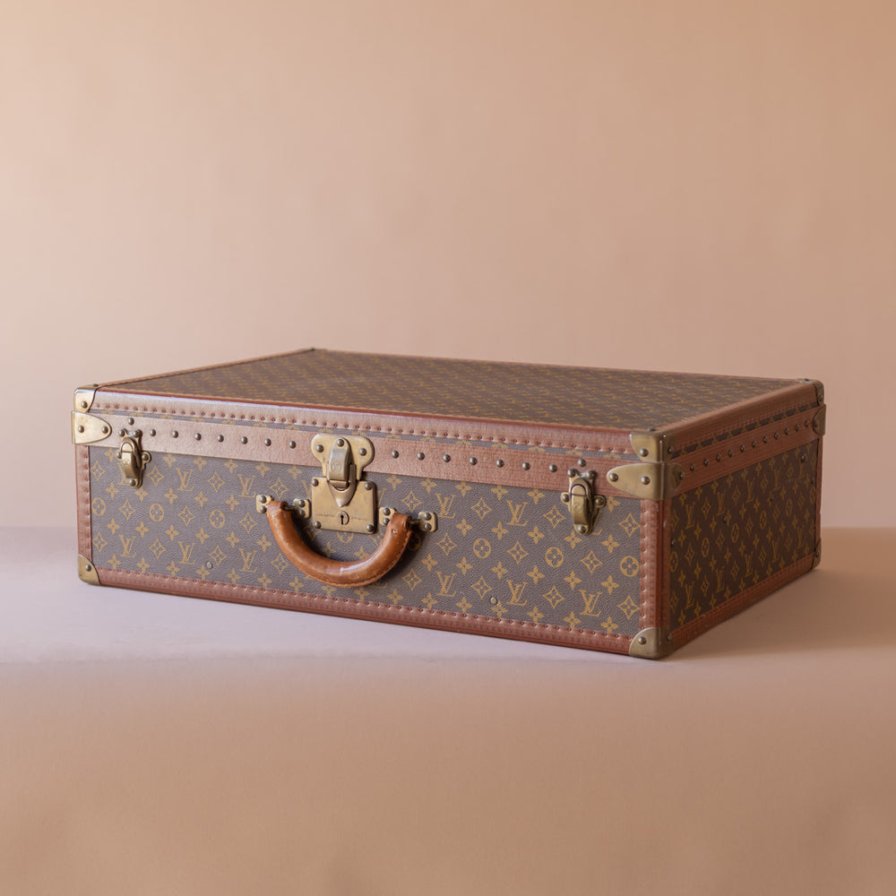 Vintage Louis Vuitton suitcase with hotel labels - Pinth Vintage