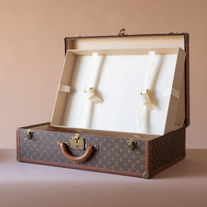 At Auction: Louis Vuitton - Alzer monogram suitcase, numbered