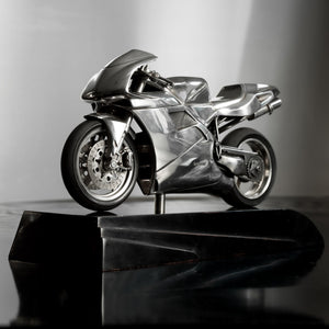 Silver Scale Model of Ducati 916 Motorcycle