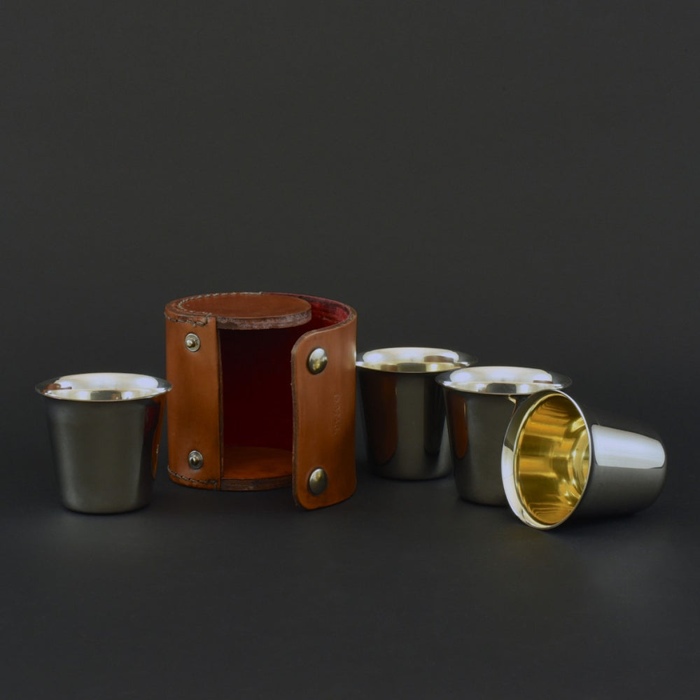 Set of Four Beakers in Leather Case