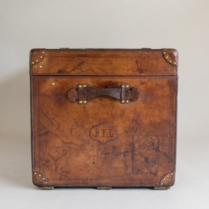 A leather Goyard steamer trunk with brass lock & catches and original interior lining.