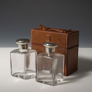 Leather Cased Silver Top Bottles