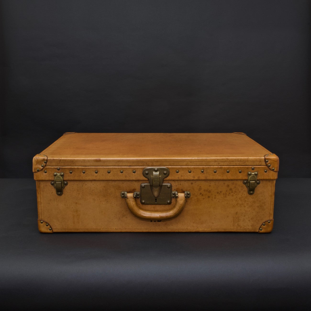 Louis Vuitton 'Vache Naturelle' Tan Leather Suitcase, circa 1935