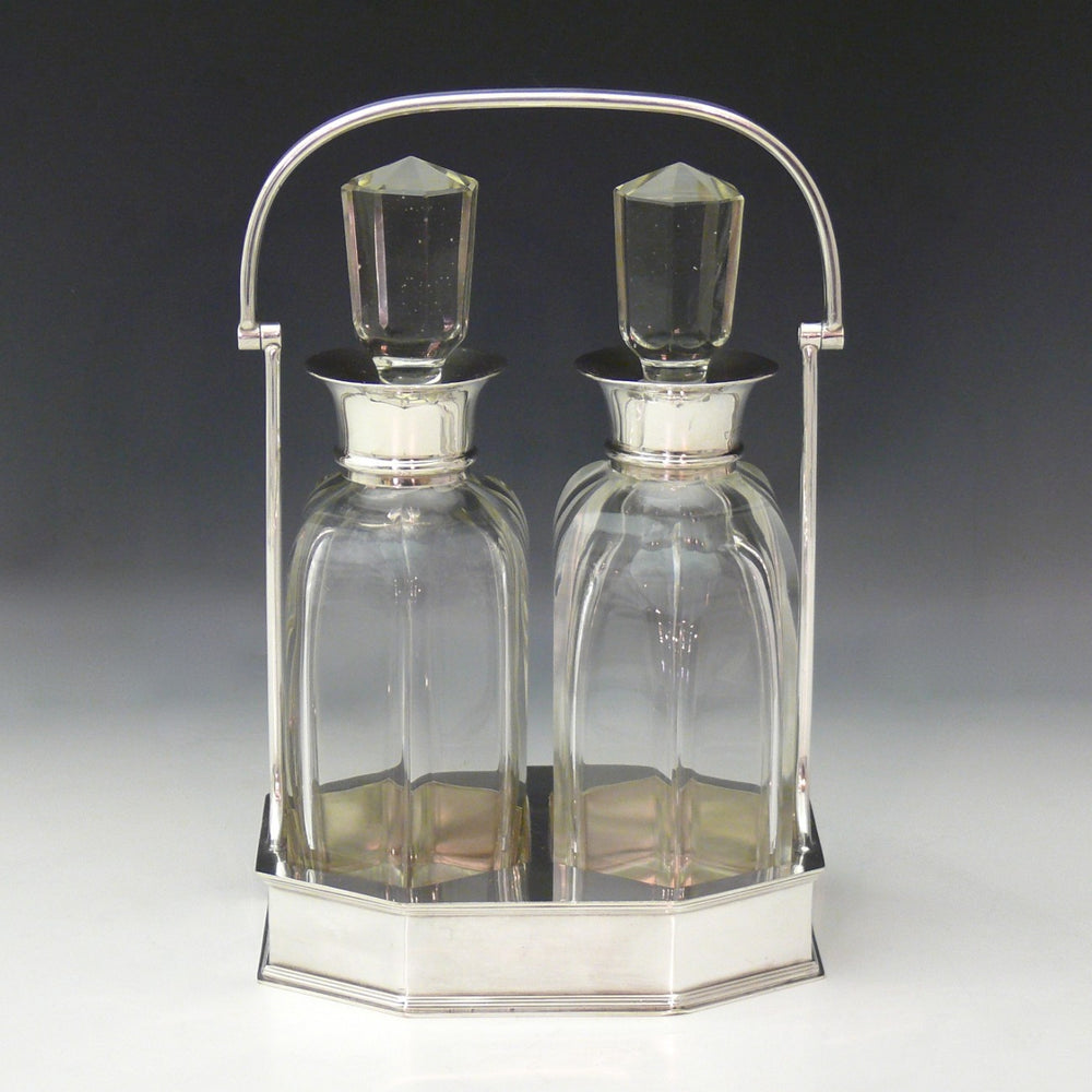 Pair of Cut Glass Silver Collared Decanters